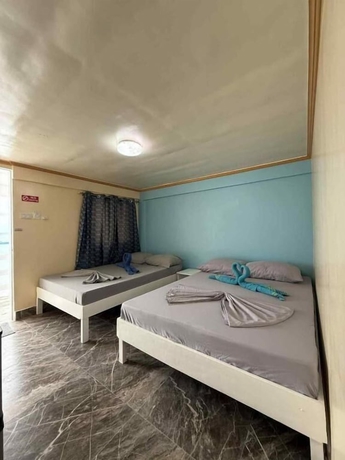 Imagen de la habitación del Hotel Playa Blanca Beach Resort and Dive Centre. Foto 13