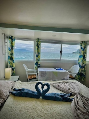 Imagen de la habitación del Hotel Playa Blanca Beach Resort and Dive Centre. Foto 16