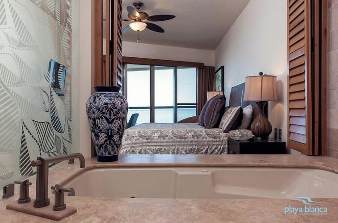 Imagen de la habitación del Hotel Playa Blanca Premier Resort I. Foto 14