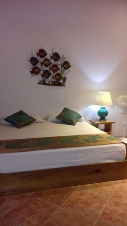 Imagen de la habitación del Hotel Playa Bluff. Foto 8
