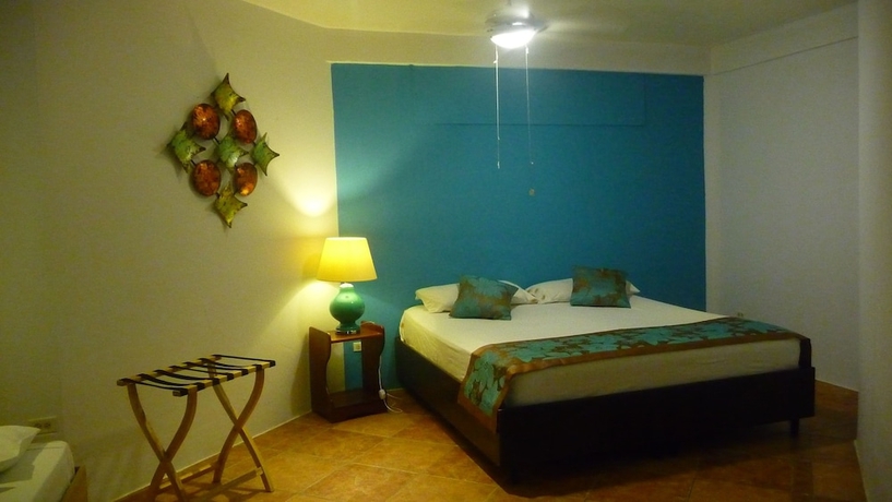 Imagen de la habitación del Hotel Playa Bluff. Foto 12