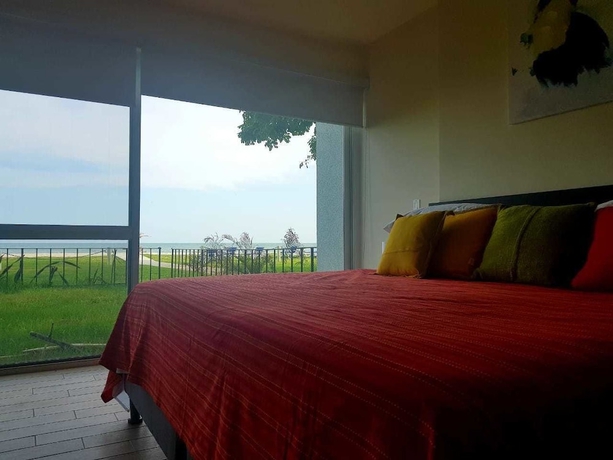 Imagen de la habitación del Hotel Playa Caracol Residences Vacation Rental. Foto 3