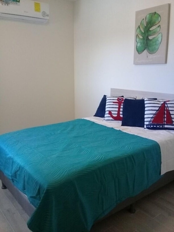 Imagen de la habitación del Hotel Playa Caracol Residences Vacation Rental. Foto 5