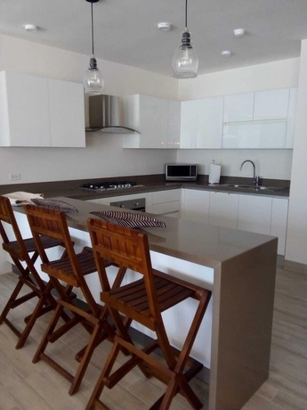 Imagen de la habitación del Hotel Playa Caracol Residences Vacation Rental. Foto 6