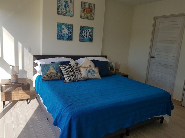 Imagen de la habitación del Hotel Playa Caracol Residences Vacation Rental. Foto 8
