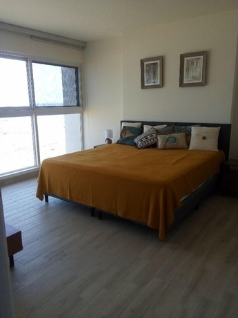 Imagen de la habitación del Hotel Playa Caracol Residences Vacation Rental. Foto 9