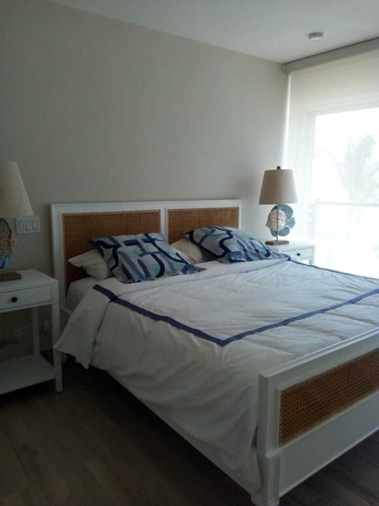 Imagen de la habitación del Hotel Playa Caracol Residences Vacation Rental. Foto 14