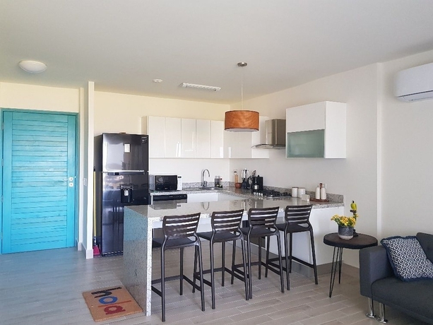 Imagen de la habitación del Hotel Playa Caracol Residences Vacation Rental. Foto 16