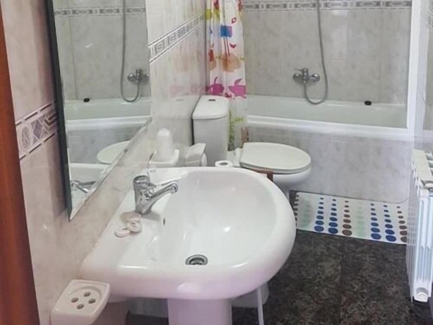 Imagen de la habitación del Hotel Playa De Quenxe. Foto 9