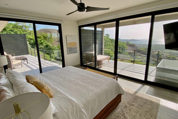 Imagen de la habitación del Hotel Playa Flamingo Beautiful new 5-br Oceanview Villa - Luxury Casa de Iluminacion. Foto 9