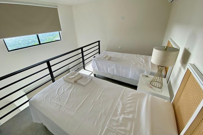 Imagen de la habitación del Hotel Playa Flamingo Beautiful new 5-br Oceanview Villa - Luxury Casa de Iluminacion. Foto 16