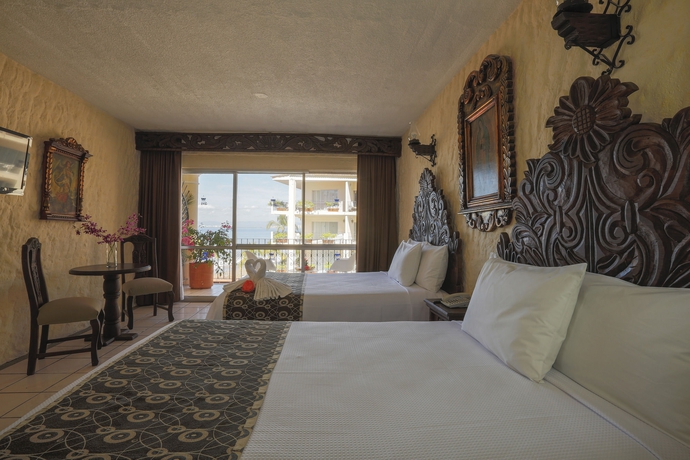 Imagen de la habitación del Hotel Playa Los Arcos Beach Resort and Spa. Foto 6