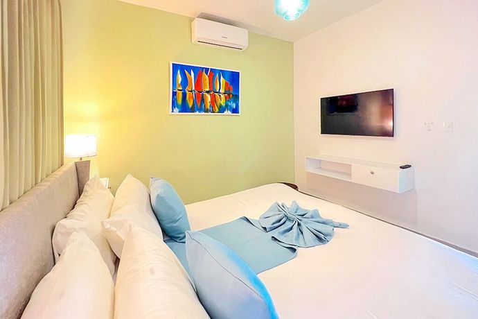 Imagen de la habitación del Hotel Playa Palmera Beach Resort. Foto 16