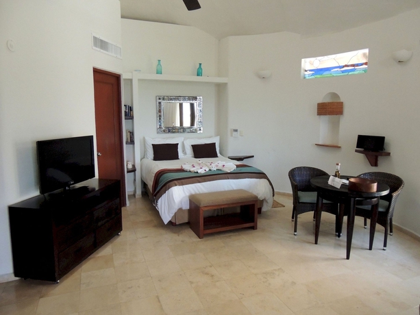 Imagen de la habitación del Hotel Playa Palms Beach. Foto 15