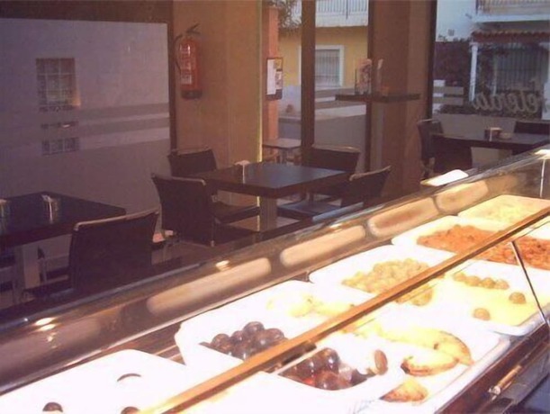 Imagen del bar/restaurante del Hotel Playa Terreros by Blossom Hotels. Foto 11