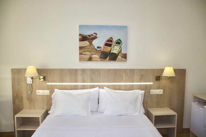 Imagen de la habitación del Hotel Playa de Lago. Foto 20