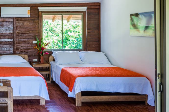 Imagen de la habitación del Hotel Playa de Oro Lodge. Foto 16