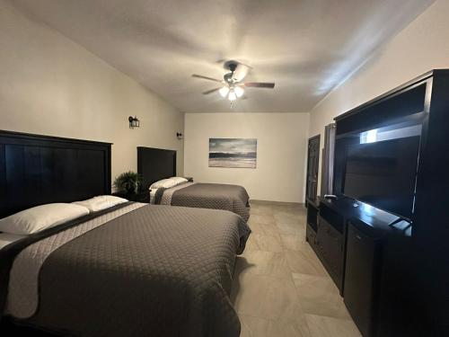 Imagen de la habitación del Hotel Playas Suites. Foto 18