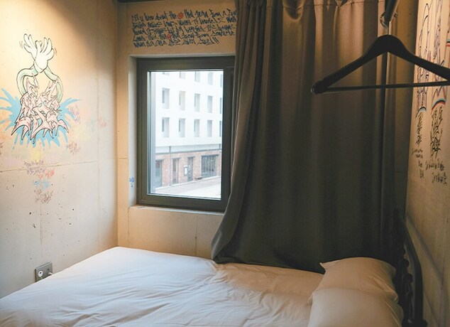 Imagen de la habitación del Hotel Playce Camp Jeju. Foto 28