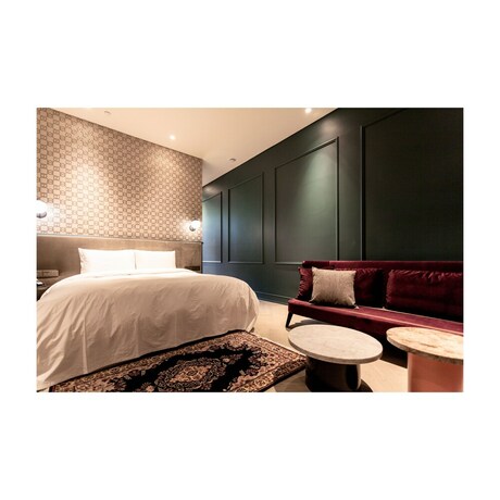 Imagen de la habitación del Hotel Playce Camp Jeju. Foto 33