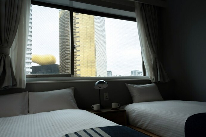 Imagen de la habitación del Hotel Playsis East Tokyo. Foto 15