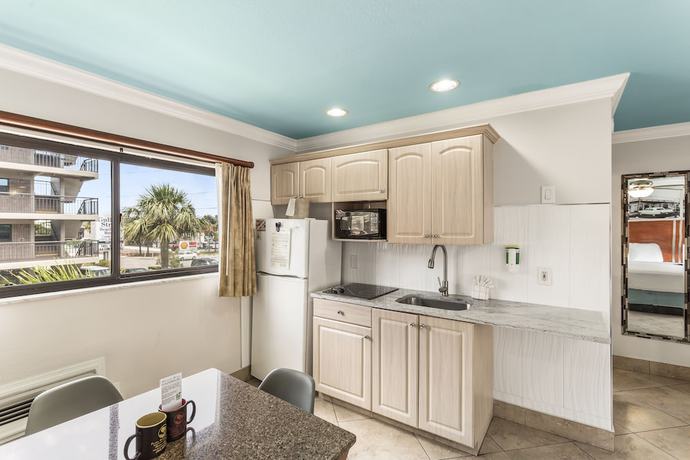 Imagen de la habitación del Hotel Plaza Beach Beachfront Resort. Foto 15