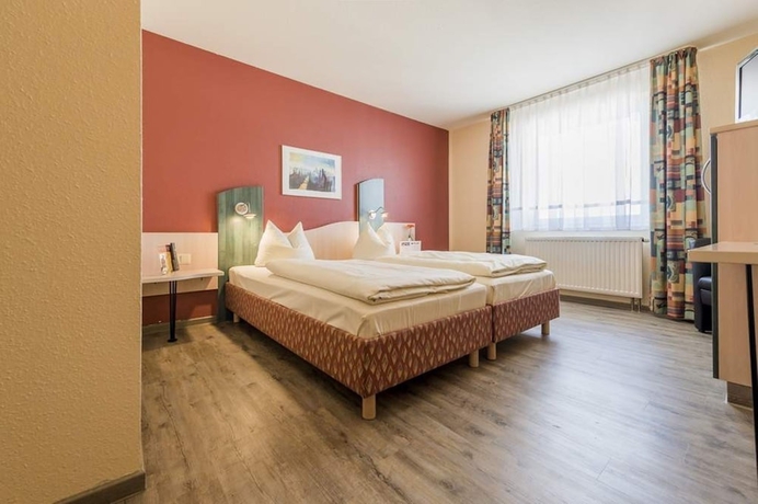 Imagen de la habitación del Hotel Plaza Bruchsal. Foto 16