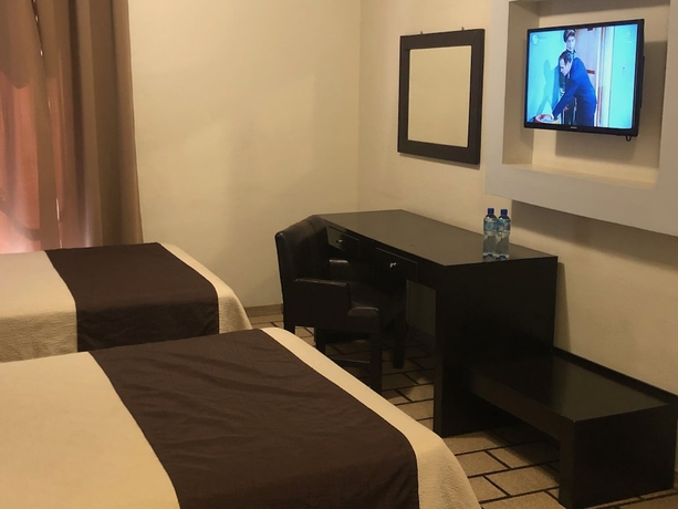 Imagen de la habitación del Hotel Plaza Centro. Foto 7
