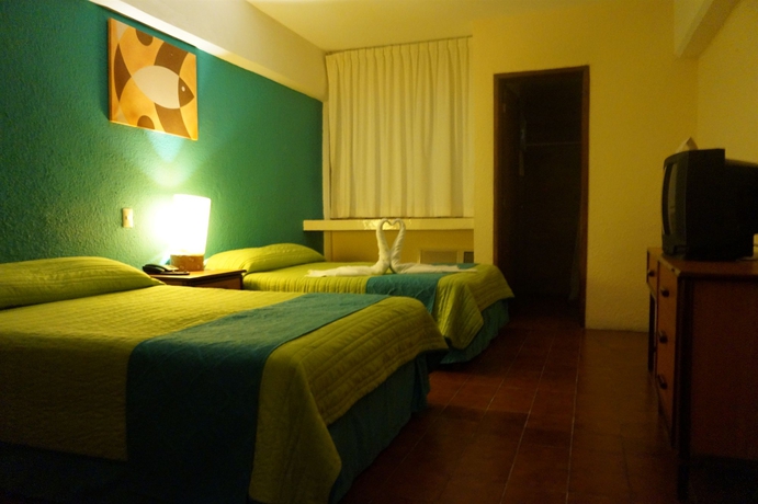 Imagen de la habitación del Hotel Plaza Cozumel. Foto 4