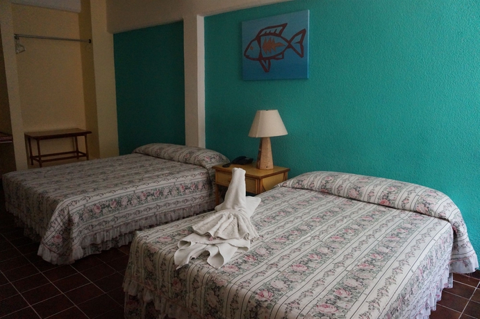 Imagen de la habitación del Hotel Plaza Cozumel. Foto 7