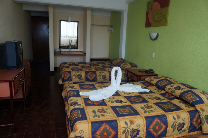 Imagen de la habitación del Hotel Plaza Cozumel. Foto 8
