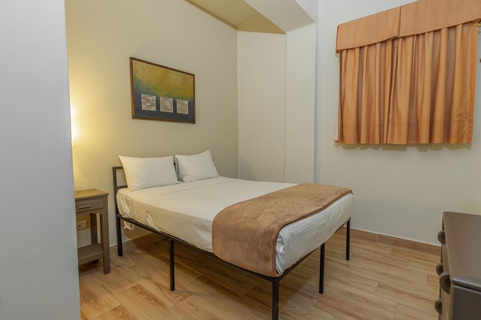 Imagen de la habitación del Hotel Plaza Del Arco Express. Foto 10