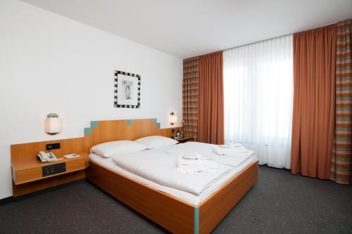 Imagen de la habitación del Hotel Plaza, Duisburgo. Foto 7