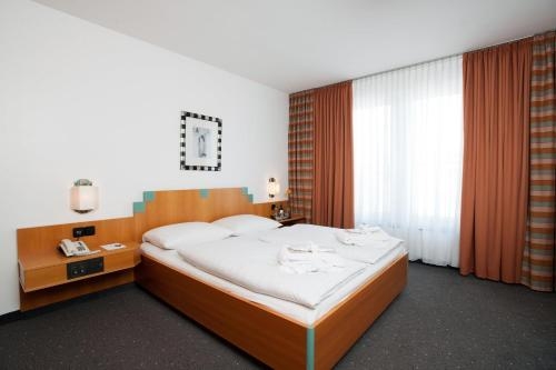 Imagen de la habitación del Hotel Plaza, Duisburgo. Foto 8