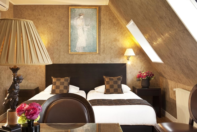 Imagen de la habitación del Hotel Plaza Elysées. Foto 3