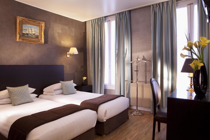 Imagen de la habitación del Hotel Plaza Elysées. Foto 6