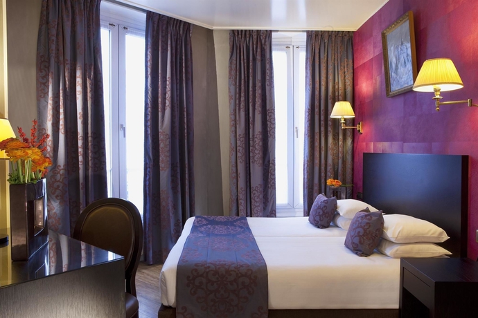 Imagen de la habitación del Hotel Plaza Elysées. Foto 7