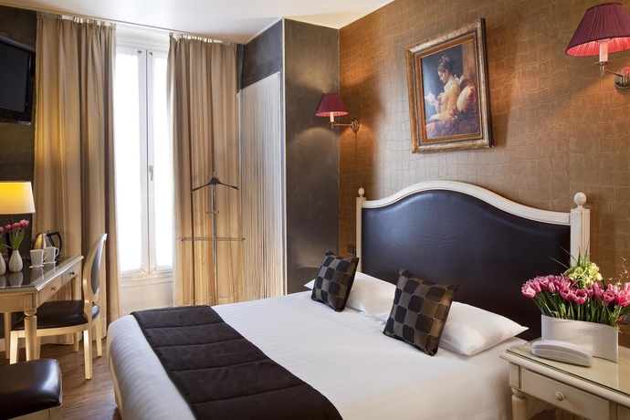 Imagen de la habitación del Hotel Plaza Elysées. Foto 9