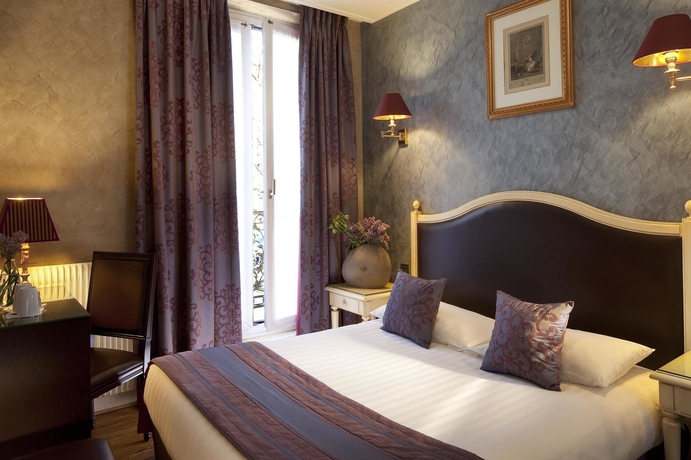 Imagen de la habitación del Hotel Plaza Elysées. Foto 11