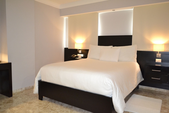 Imagen de la habitación del Hotel Plaza Florida Suites. Foto 3