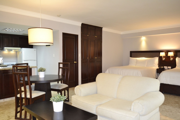 Imagen de la habitación del Hotel Plaza Florida Suites. Foto 4