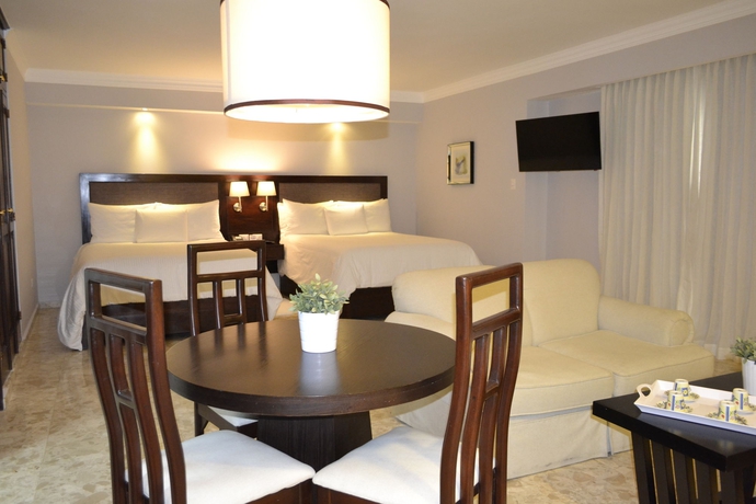 Imagen de la habitación del Hotel Plaza Florida Suites. Foto 5