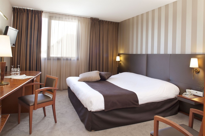 Imagen de la habitación del Hotel Plaza Futuroscope. Foto 10