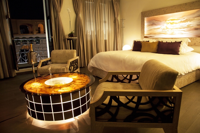 Imagen de la habitación del Hotel Plaza Gallery and Boutique. Foto 13