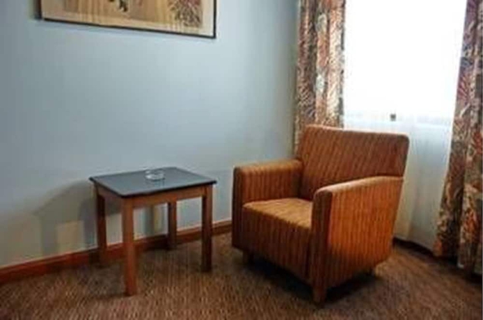 Imagen de la habitación del Hotel Plaza Grand. Foto 5
