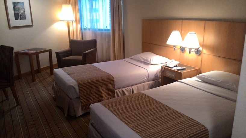 Imagen de la habitación del Hotel Plaza Grand. Foto 7