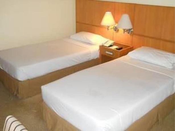 Imagen de la habitación del Hotel Plaza Grand. Foto 8