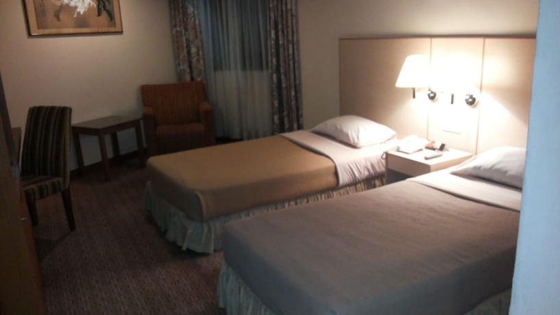 Imagen de la habitación del Hotel Plaza Grand. Foto 9