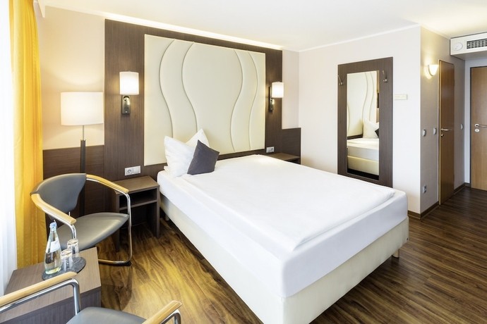 Imagen de la habitación del Hotel Plaza Hanau. Foto 15