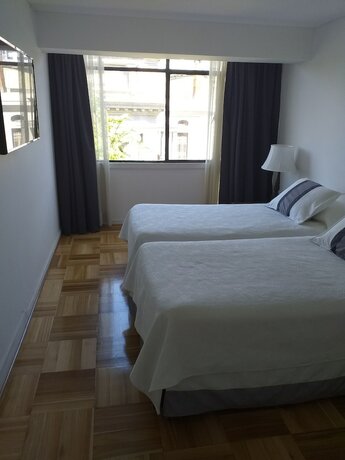 Imagen de la habitación del Hotel Plaza Huelen. Foto 14